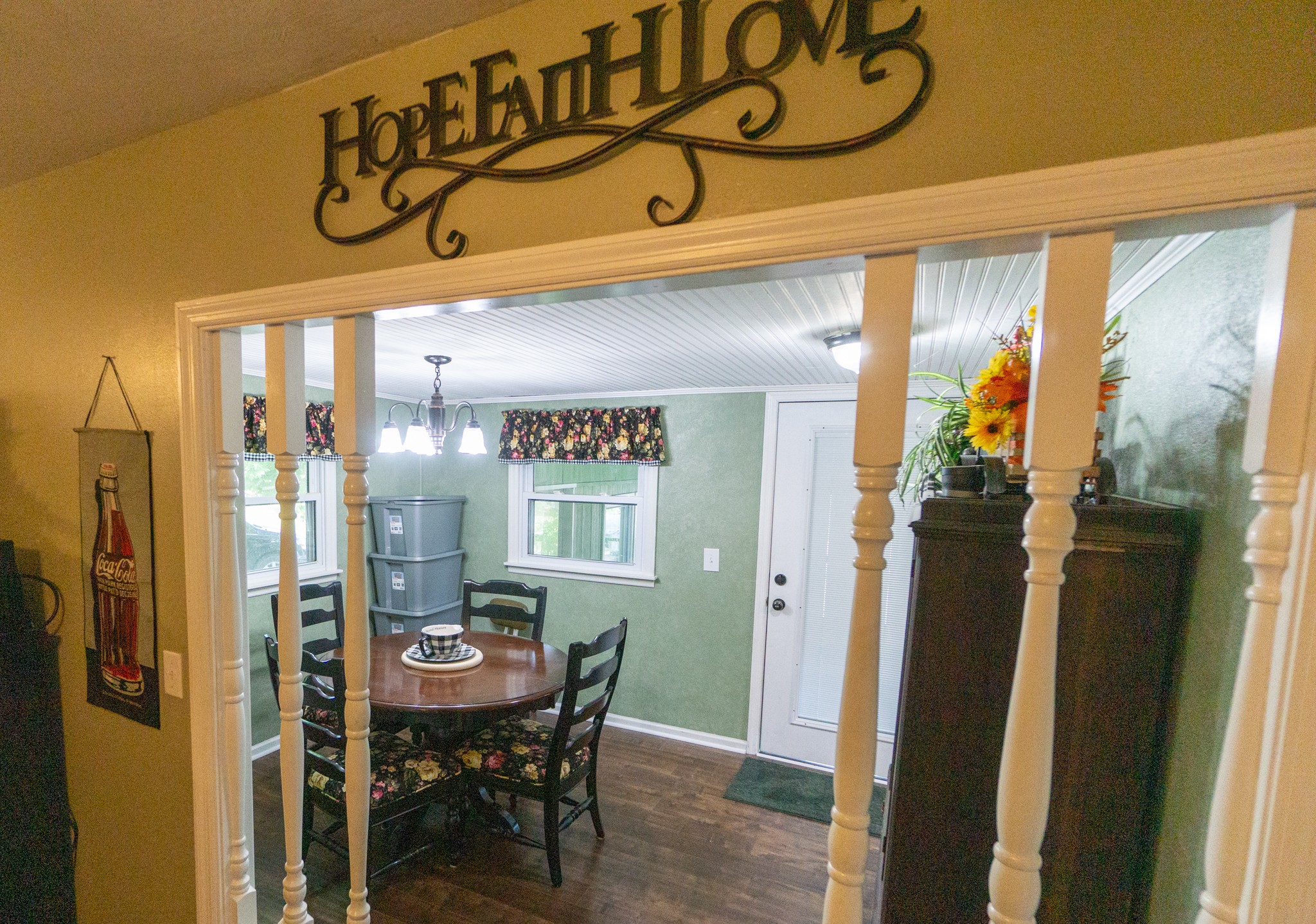 424 Dorris Road Portland, TN 37148 - Photo 23 of 48 a view of a dining room with furniture window and wooden floor