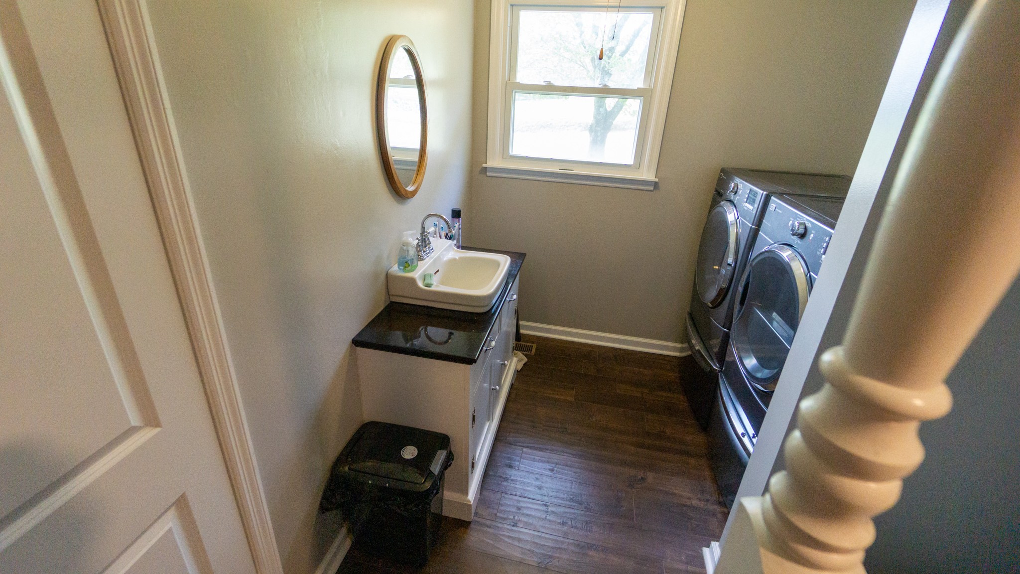 424 Dorris Road Portland, TN 37148 - Photo 28 of 48 a view of a bathroom with a sink and wooden floor