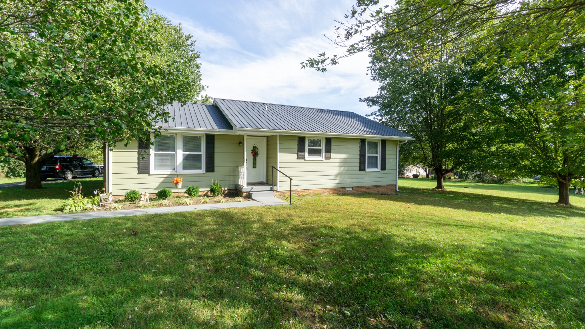 424 Dorris Road Portland, TN 37148 - Photo 29 of 48 a front view of a house with a yard