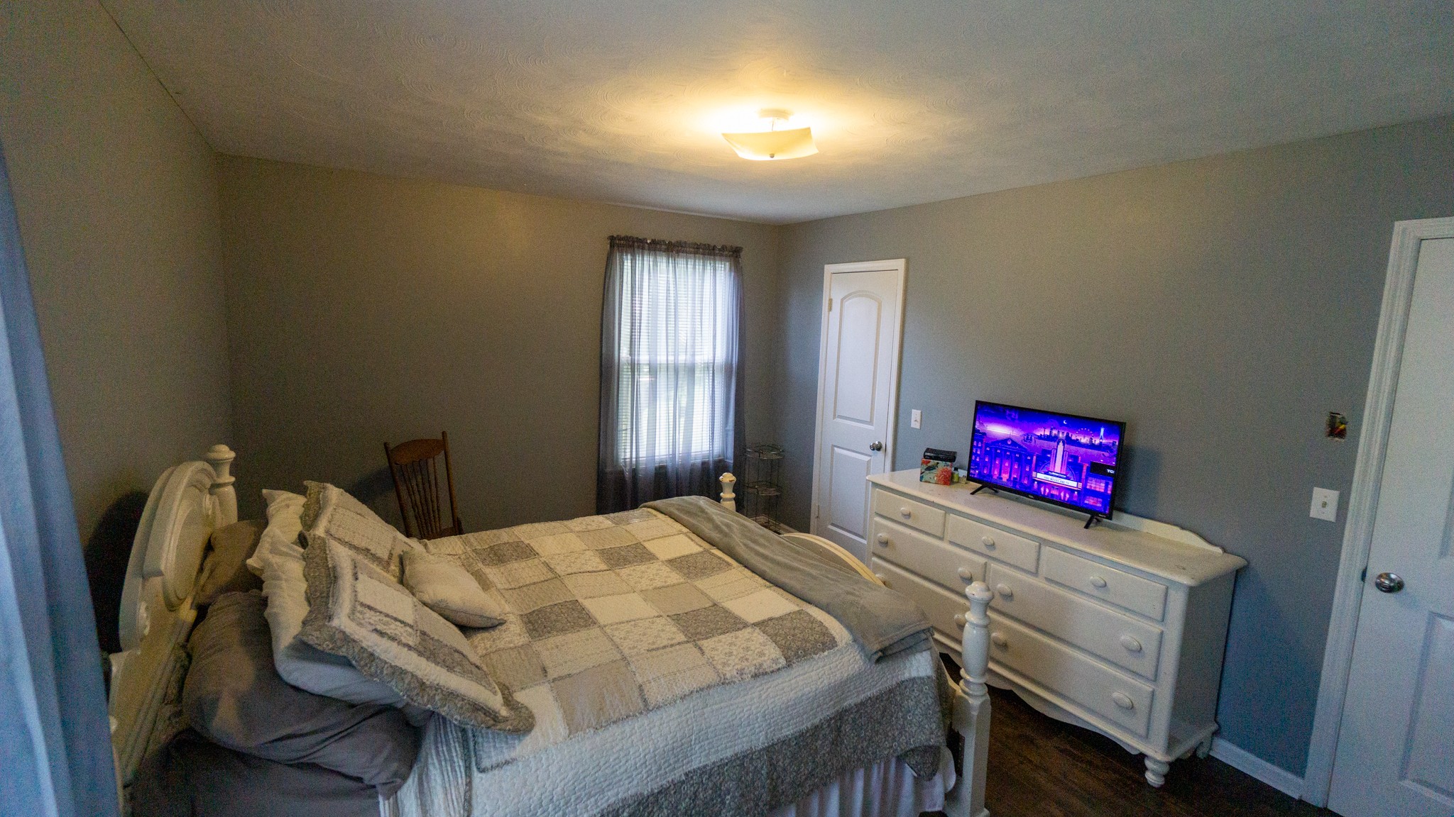 424 Dorris Road Portland, TN 37148 - Photo 32 of 48 a bedroom with a bed and a window