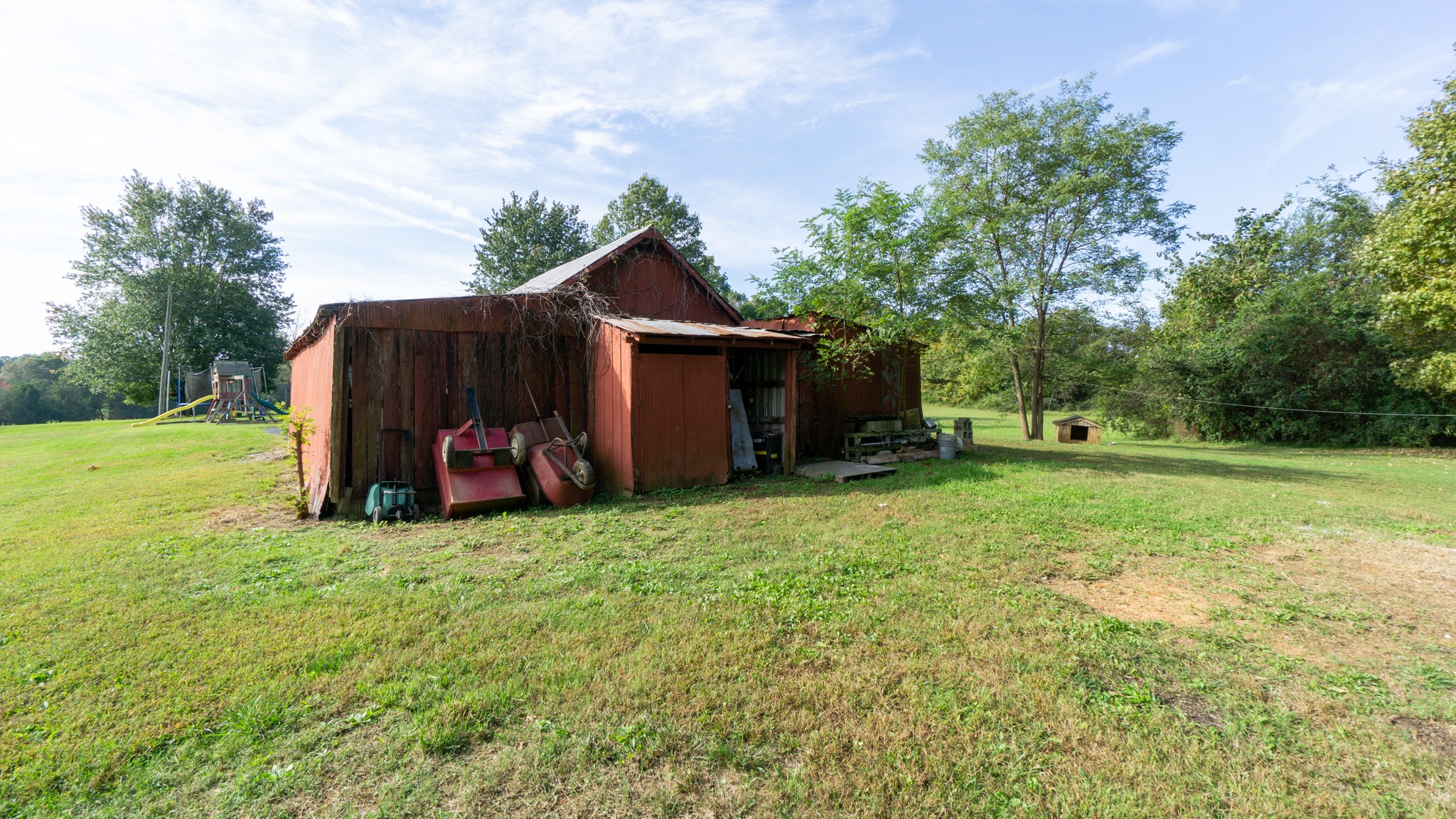 424 Dorris Road Portland, TN 37148 - Photo 42 of 48 a view of a house with backyard and sitting area