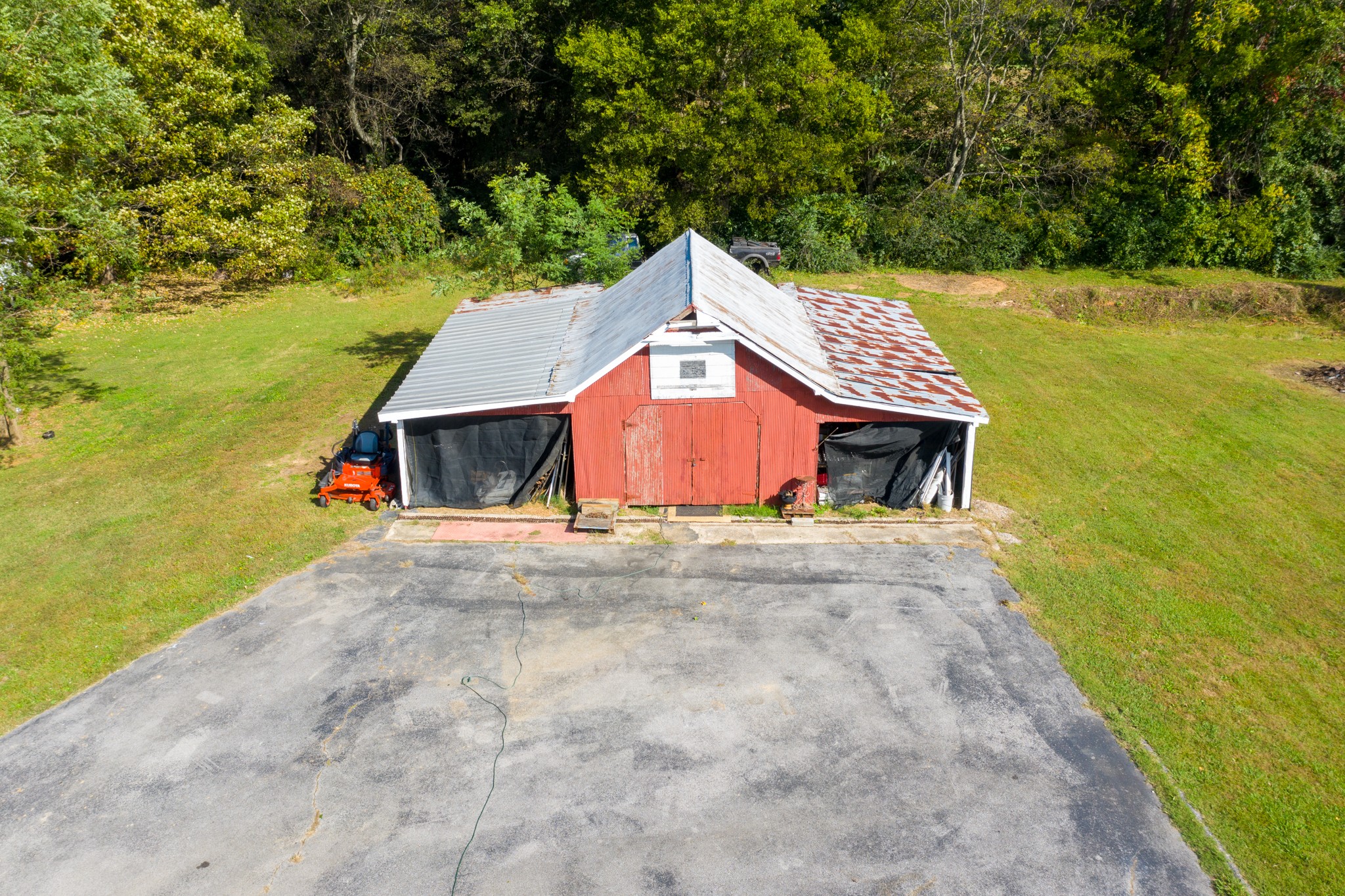 424 Dorris Road Portland, TN 37148 - Photo 9 of 48 a aerial view of a house with a yard and large tree
