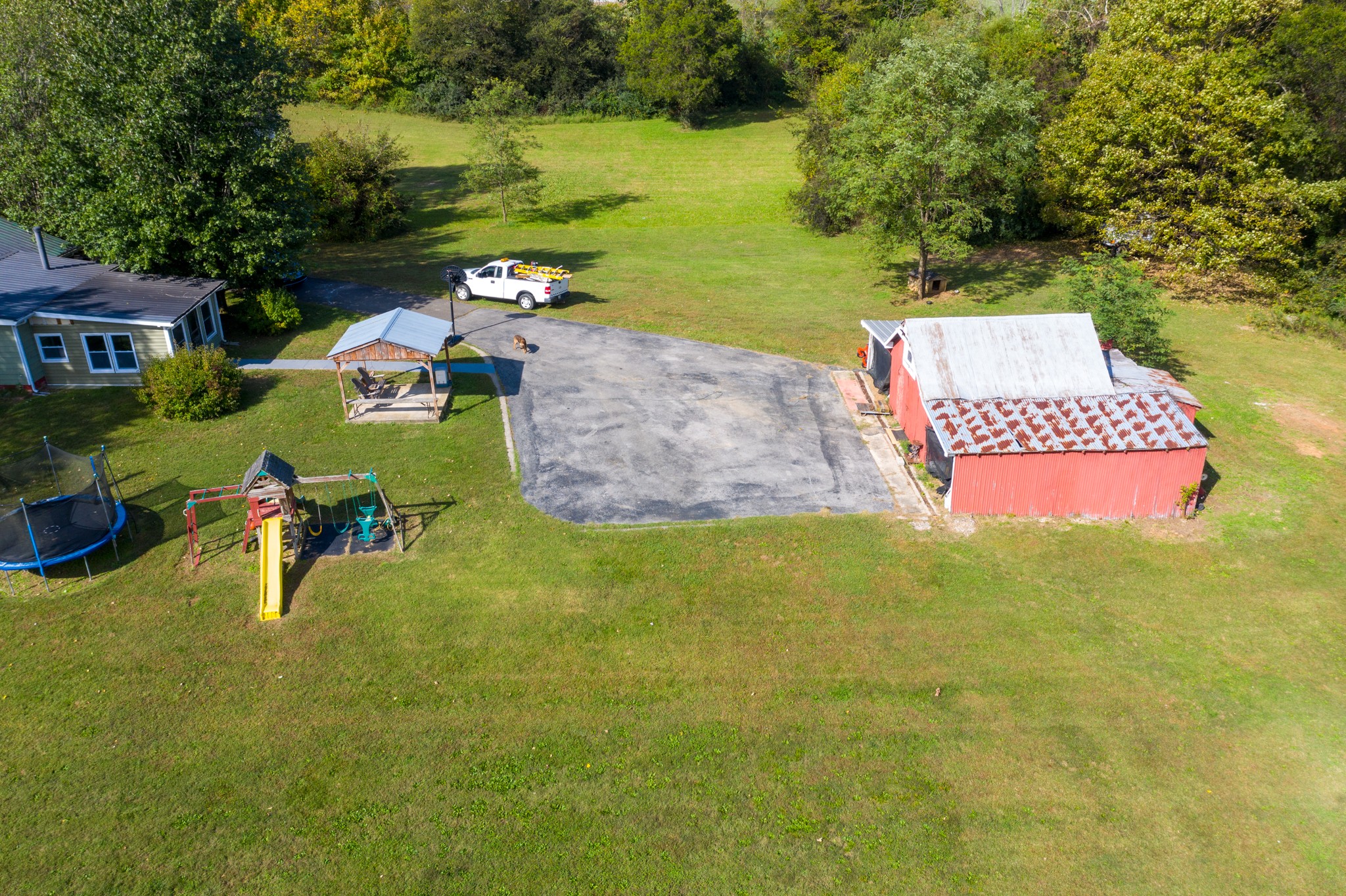 424 Dorris Road Portland, TN 37148 - Photo 10 of 48 a view of a lake with couches and wooden fence