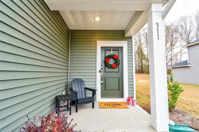 a backyard of a house with seating space