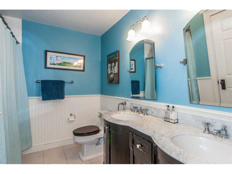 Undisclosed Address Riverside, CT 06878 - Photo 13 of 25 a bathroom with a granite countertop sink mirror and toilet