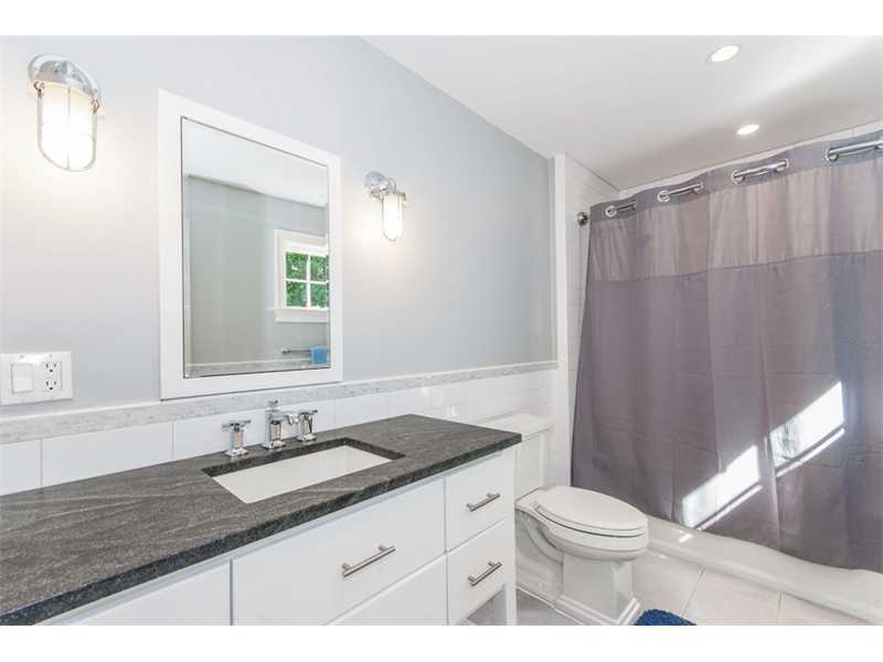 Undisclosed Address Riverside, CT 06878 - Photo 14 of 25 a bathroom with a granite countertop sink toilet and shower