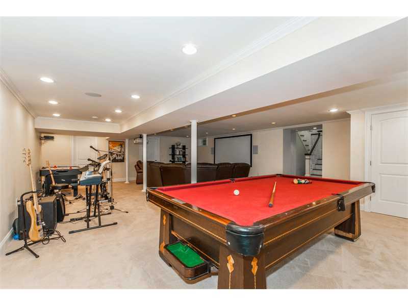 Undisclosed Address Riverside, CT 06878 - Photo 16 of 25 a room with table tennis and furniture