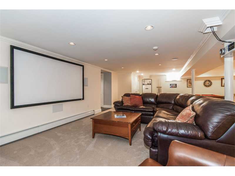 Undisclosed Address Riverside, CT 06878 - Photo 17 of 25 a living room with furniture