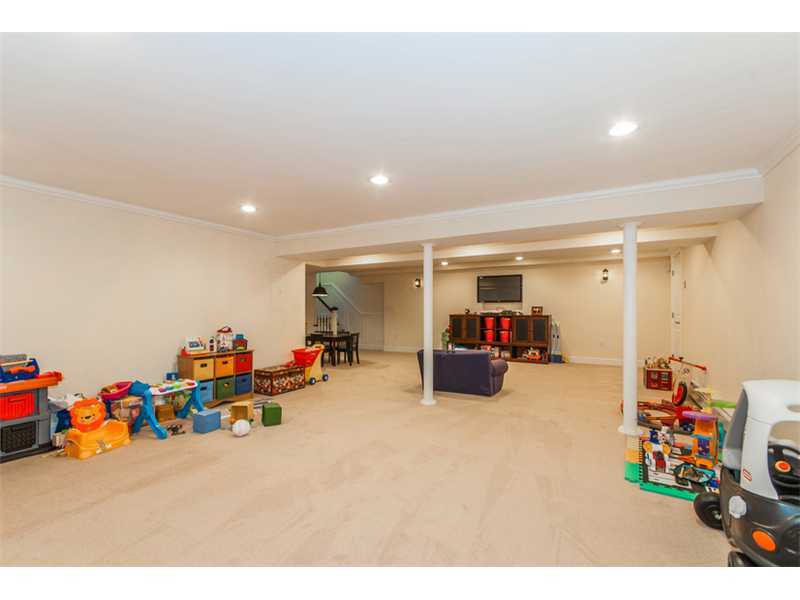 Undisclosed Address Riverside, CT 06878 - Photo 18 of 25 a living room with lots of furniture