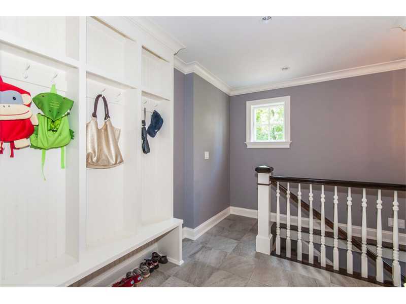 Undisclosed Address Riverside, CT 06878 - Photo 19 of 25 a view of hallway with furniture and flower pot