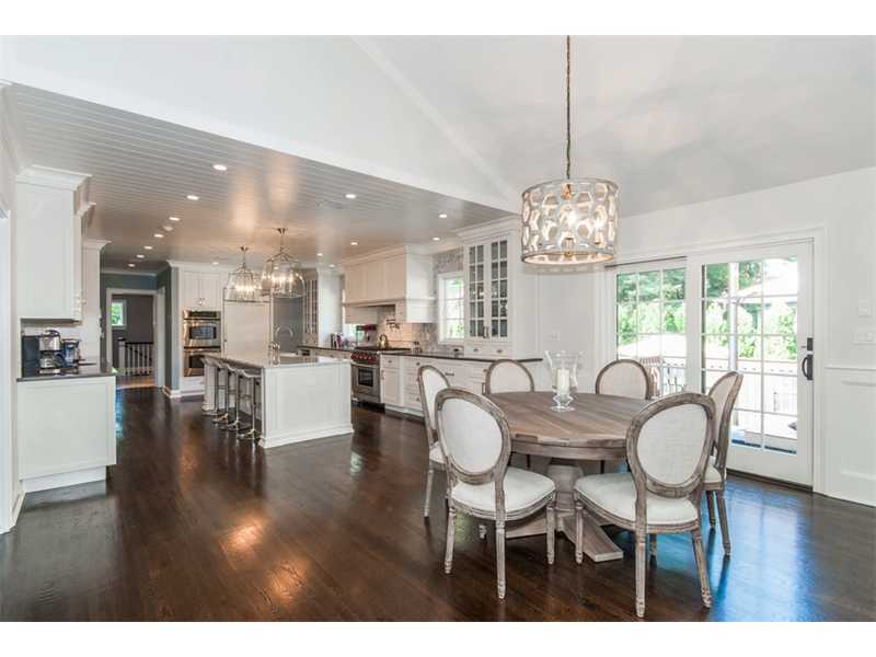 Undisclosed Address Riverside, CT 06878 - Photo 2 of 25 a dining room with furniture a chandelier and wooden floor