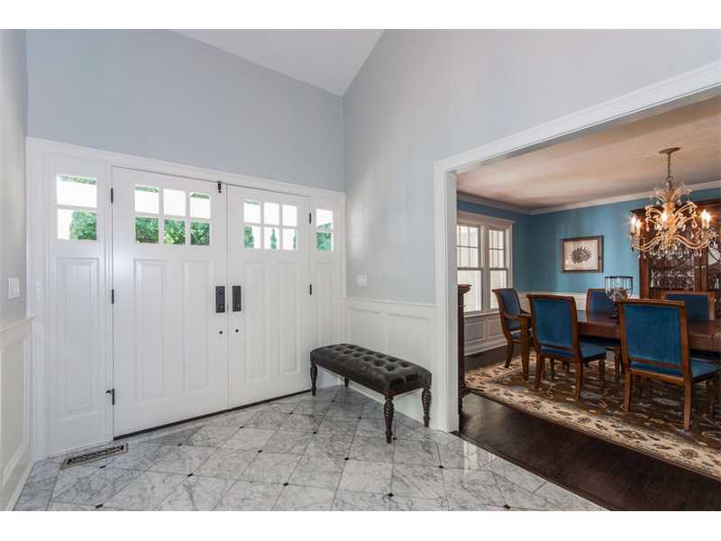 Undisclosed Address Riverside, CT 06878 - Photo 4 of 25 a living room with furniture and a dining table