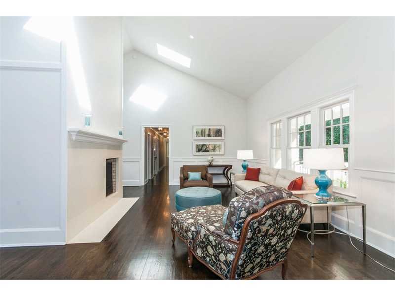 Undisclosed Address Riverside, CT 06878 - Photo 6 of 25 a living room with furniture and a fireplace