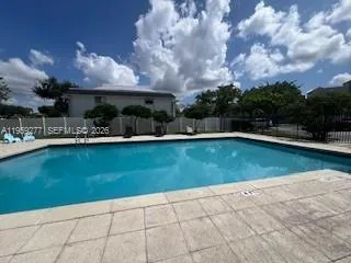 a view of an swimming pool and outdoor space