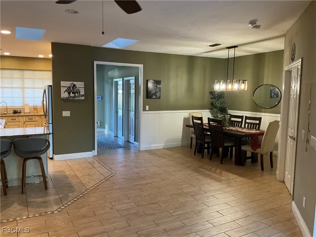 a view of a dining room with furniture
