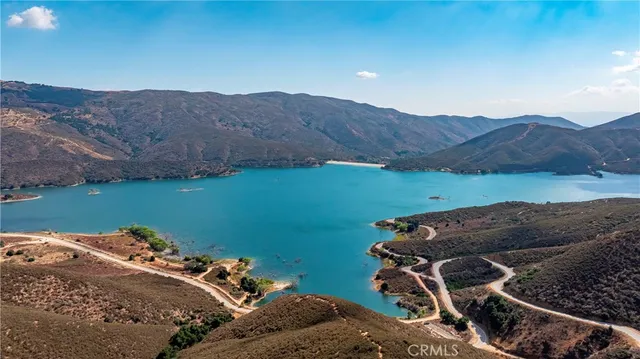 a view of a backyard with mountain view