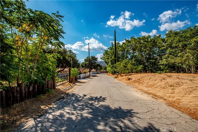 a view of a swimming pool with an outdoor seating
