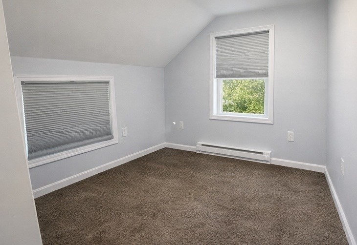 42 Mechanic Street Spencer, MA 01562 - Photo 3 of 9 an empty room with a window