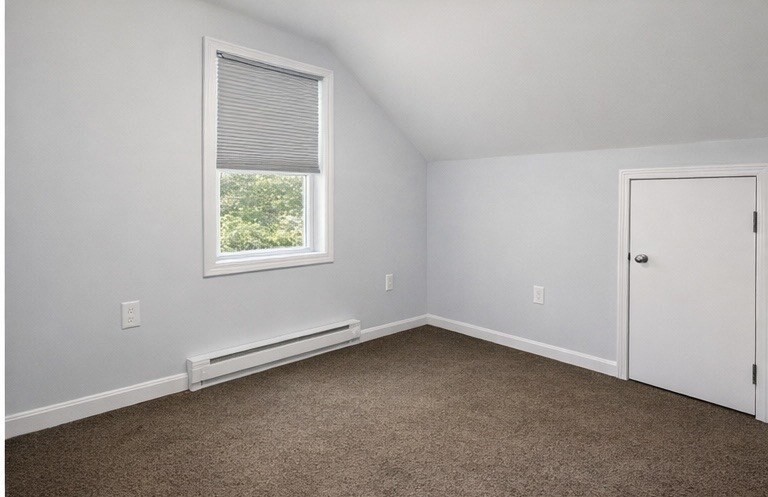 42 Mechanic Street Spencer, MA 01562 - Photo 4 of 9 an empty room with a window