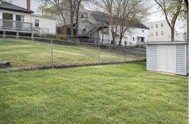 42 Mechanic Street Spencer, MA 01562 - Photo 6 of 9 a view of a house with a yard