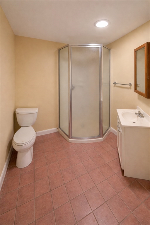 42 Mechanic Street Spencer, MA 01562 - Photo 8 of 9 a bathroom with a sink a toilet and a mirror