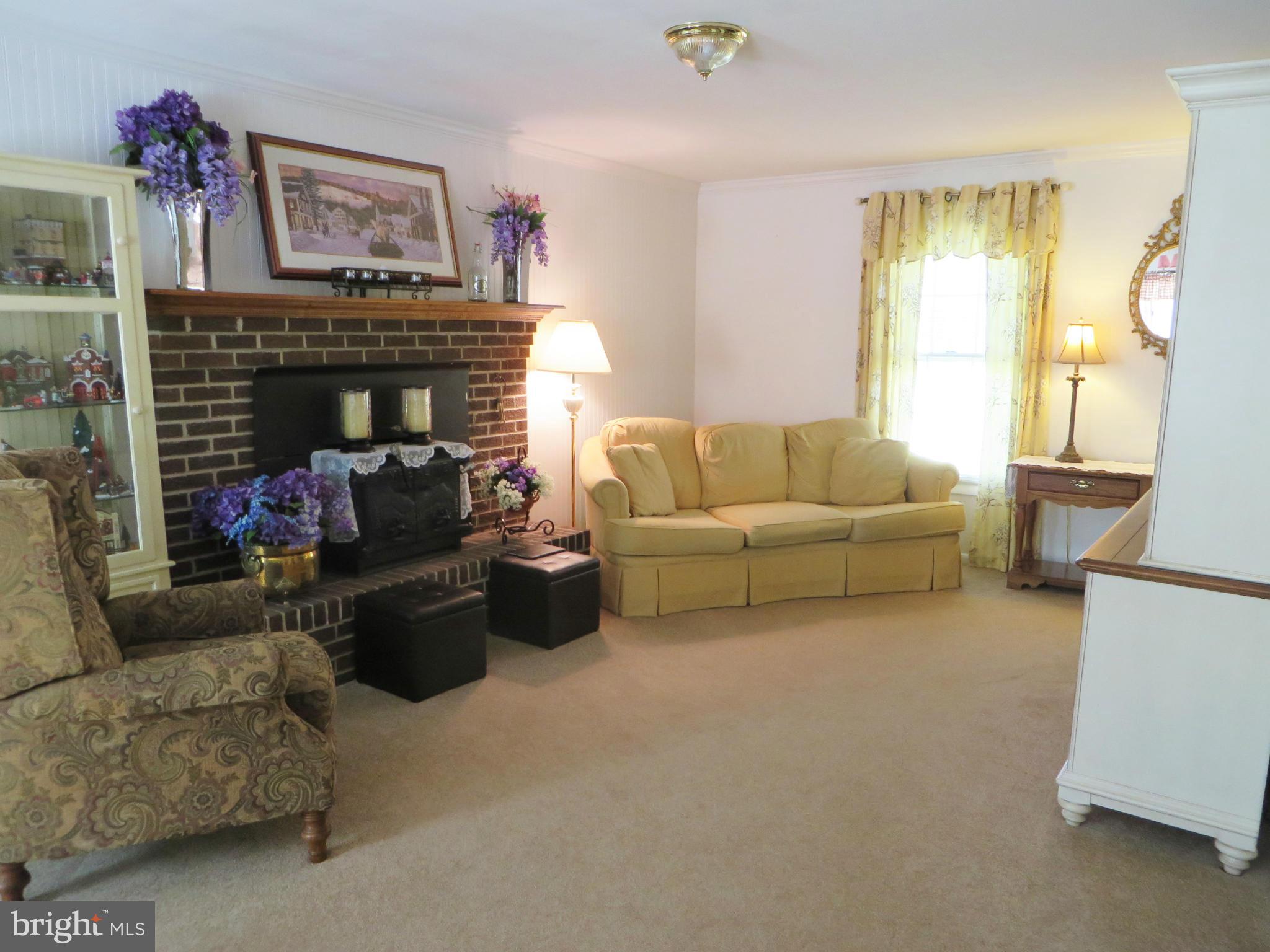 25085 Morgan Road Hollywood, MD 20636 - Photo 2 of 29 Family room with Timberline wood stove