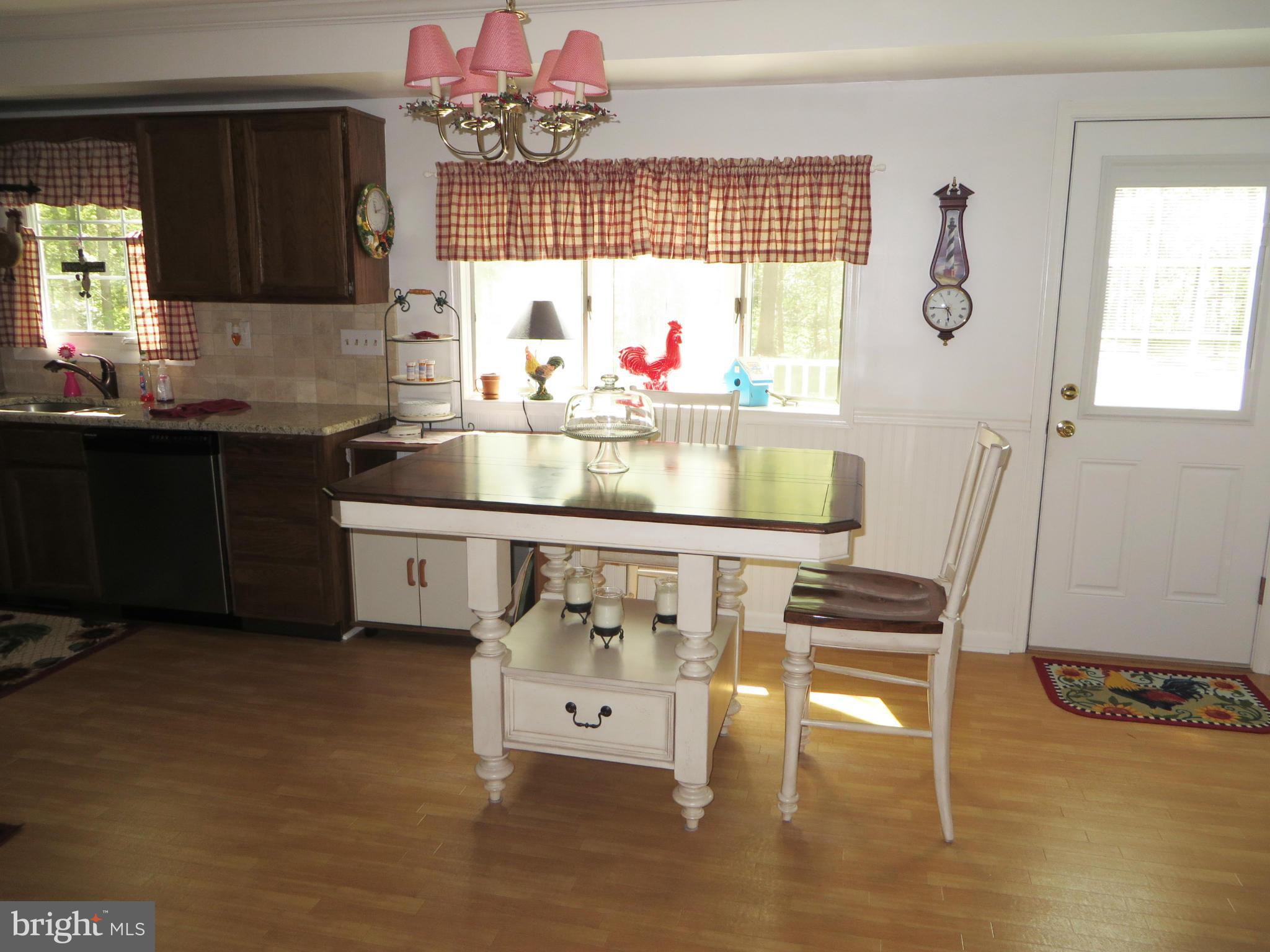 25085 Morgan Road Hollywood, MD 20636 - Photo 5 of 29 Table space between kitchen and family room