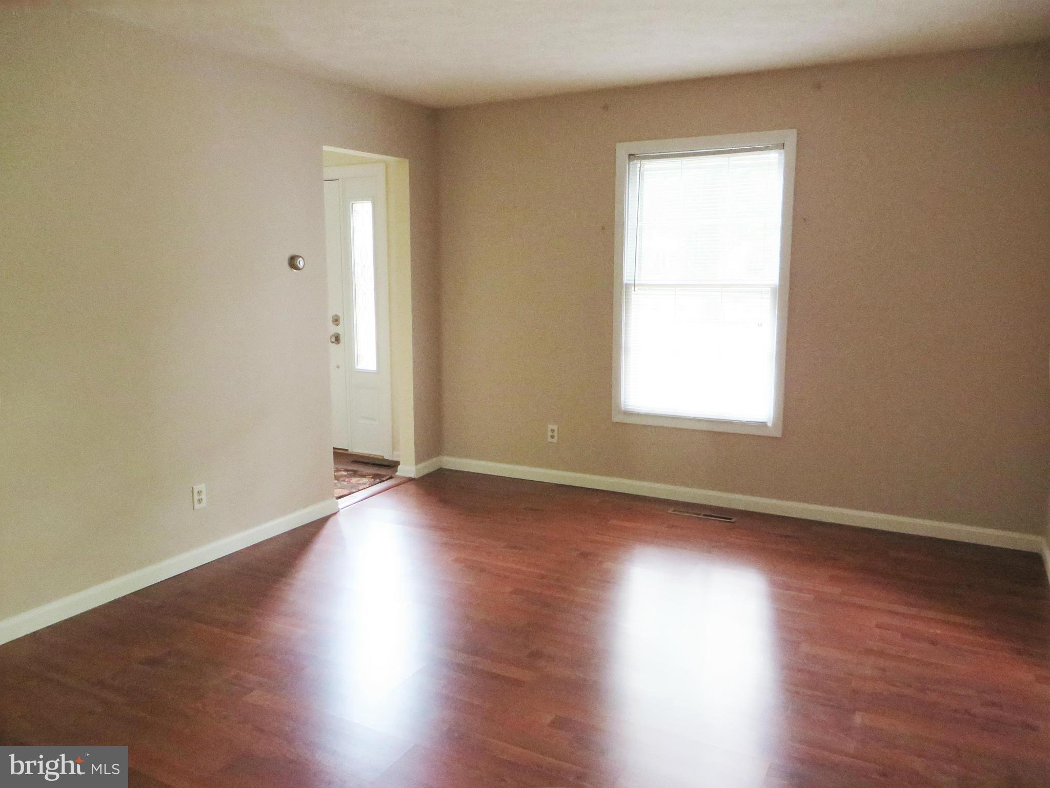 25085 Morgan Road Hollywood, MD 20636 - Photo 9 of 29 Living room, nice laminate flooring