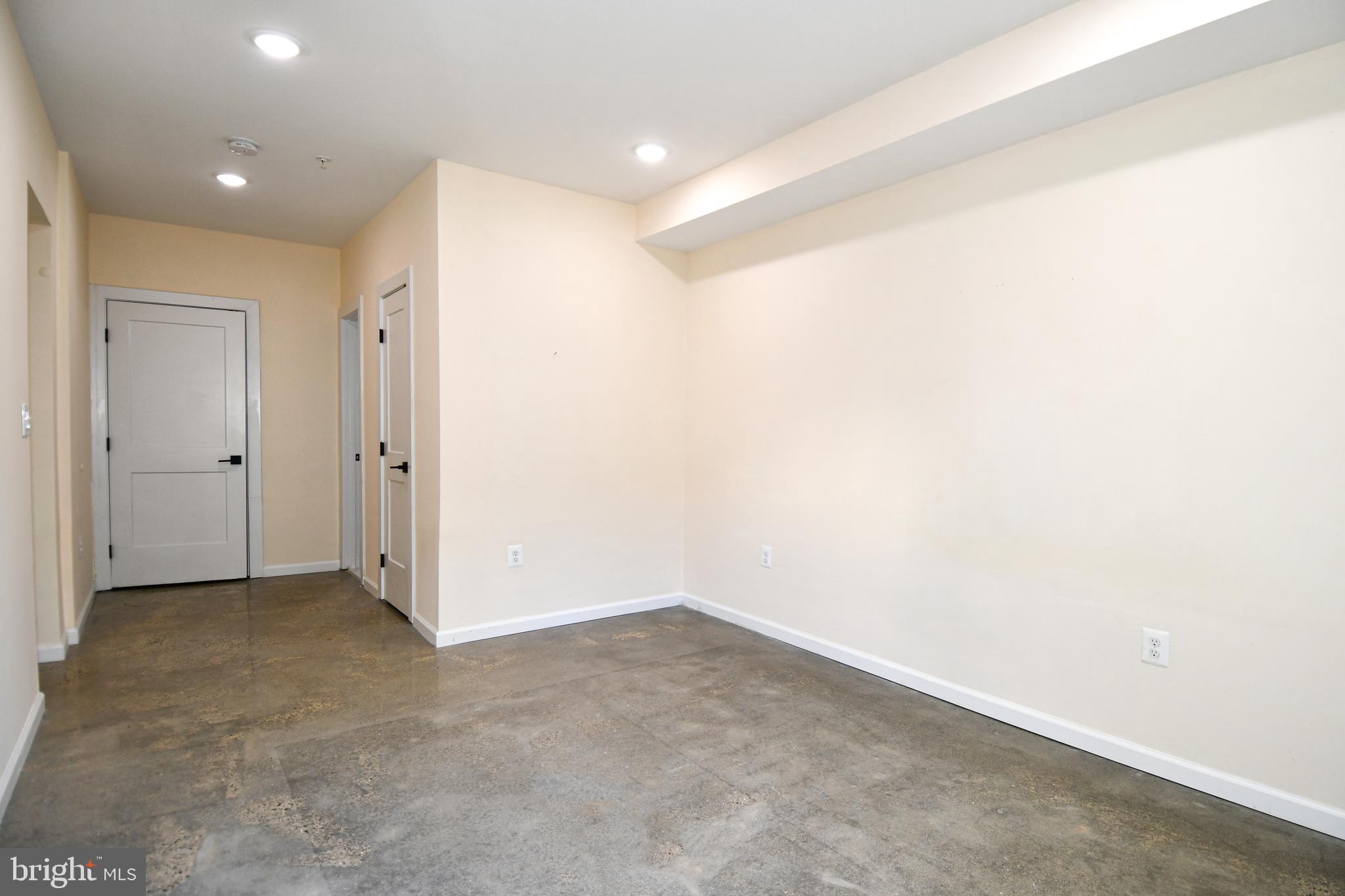 1040 Bladensburg Road Northeast, Unit 0B Washington, DC 20002 - Photo 12 of 21 Full bath and Closet doors on right