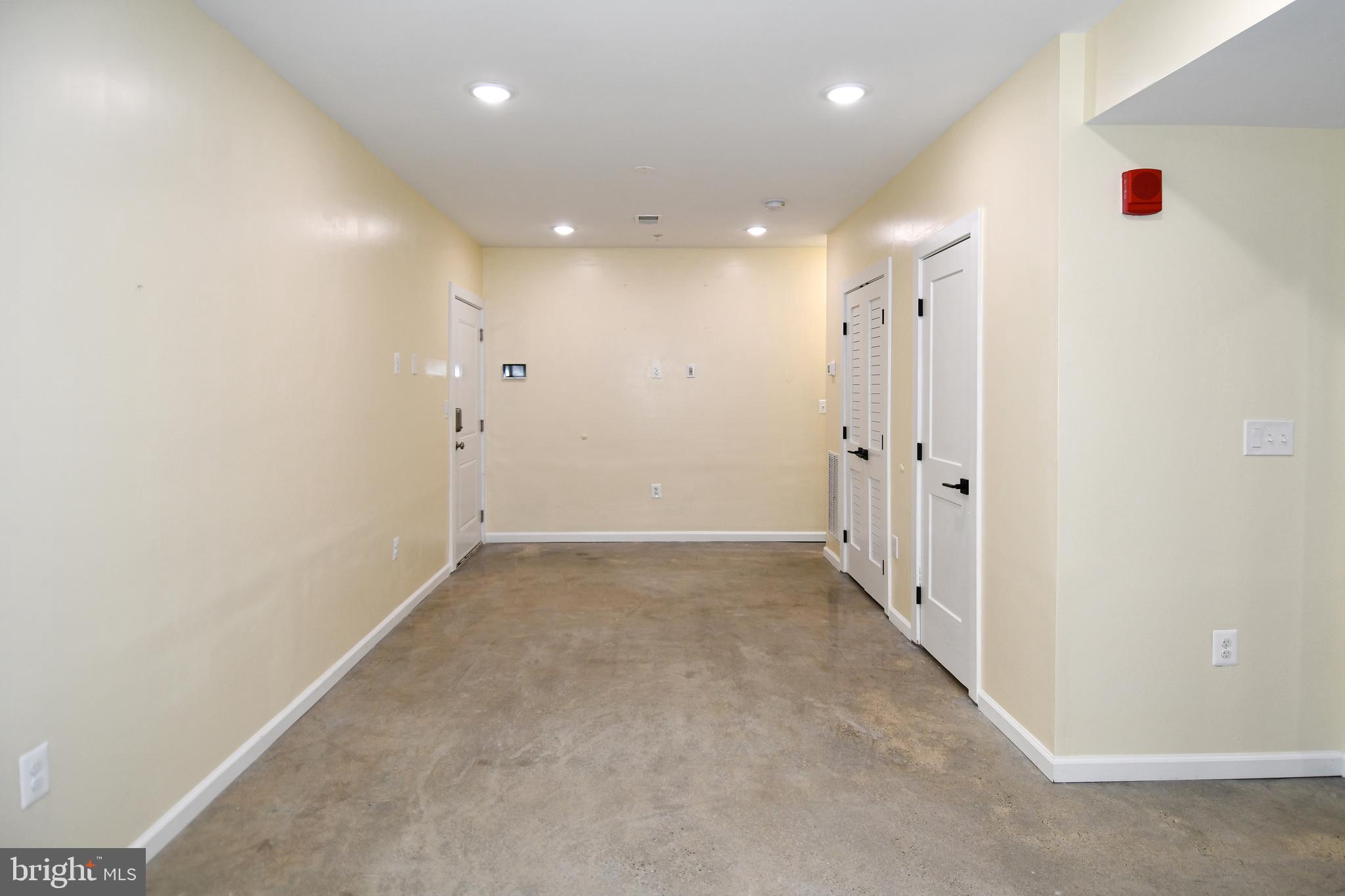 1040 Bladensburg Road Northeast, Unit 0B Washington, DC 20002 - Photo 3 of 21 Additional storage closet in right corner