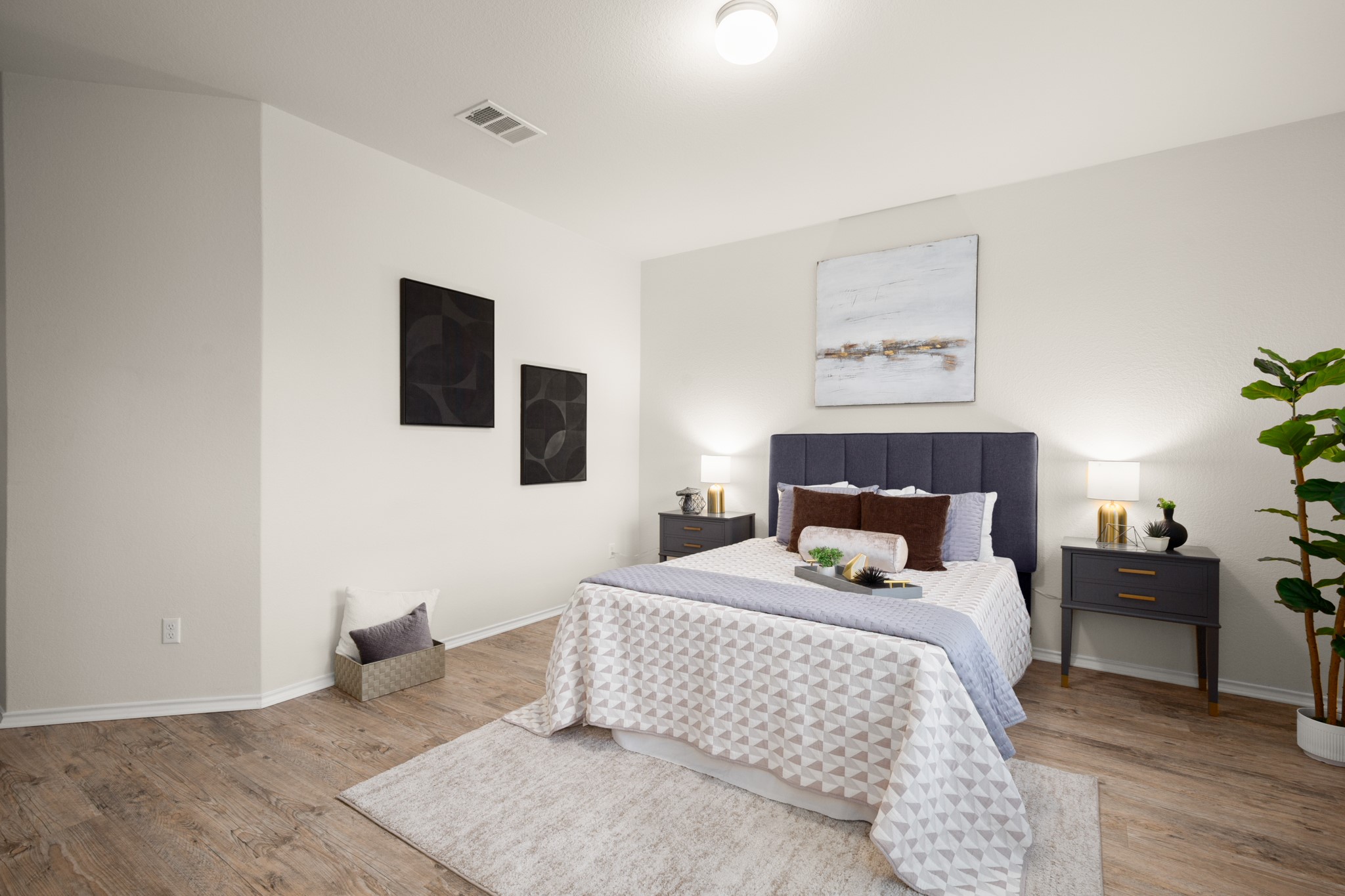 380 Bonnet Boulevard Georgetown, TX 78628 - Photo 16 of 26 a bedroom with a bed and wooden floor