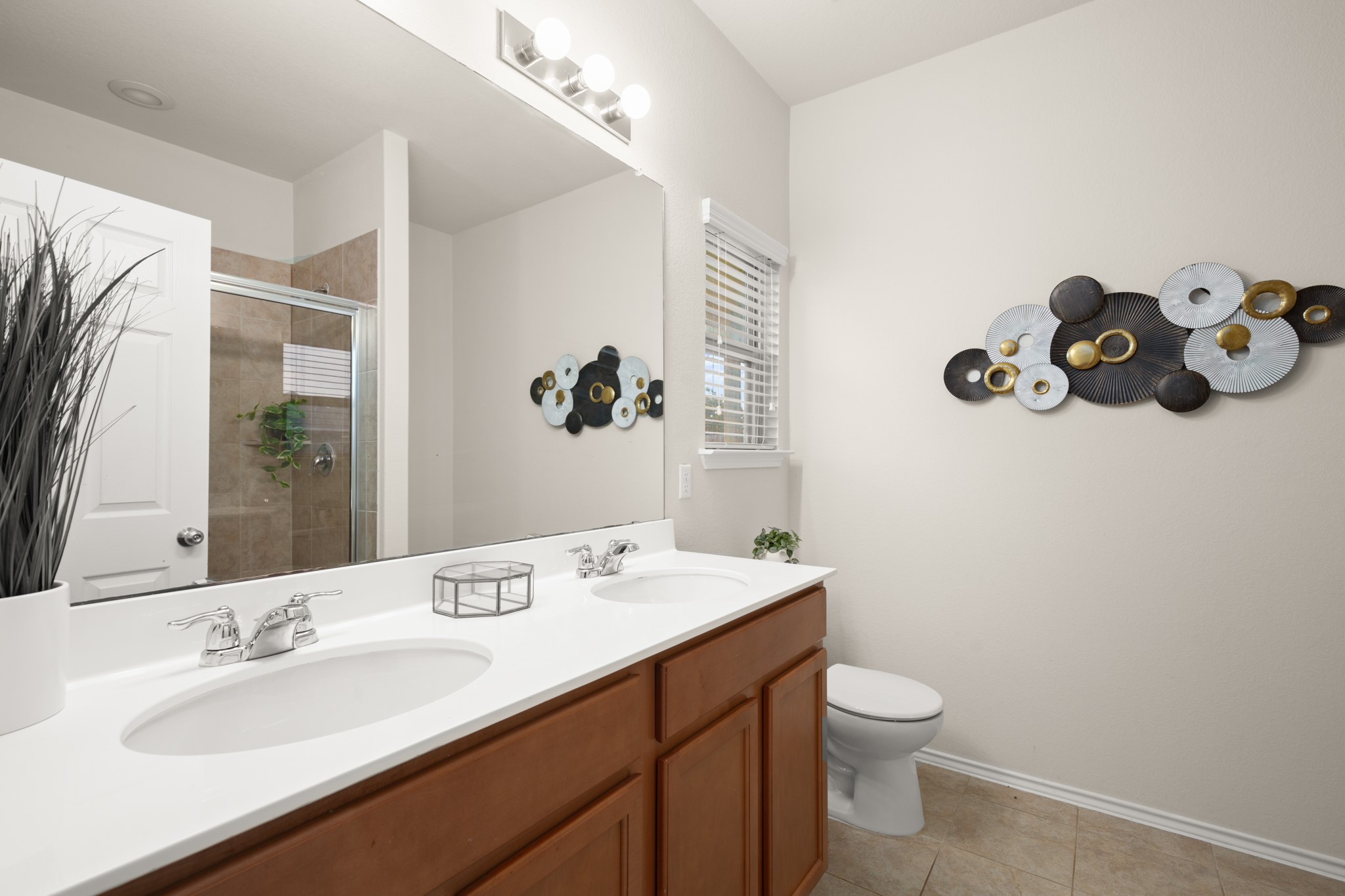 380 Bonnet Boulevard Georgetown, TX 78628 - Photo 17 of 26 a bathroom with a sink mirror and toilet