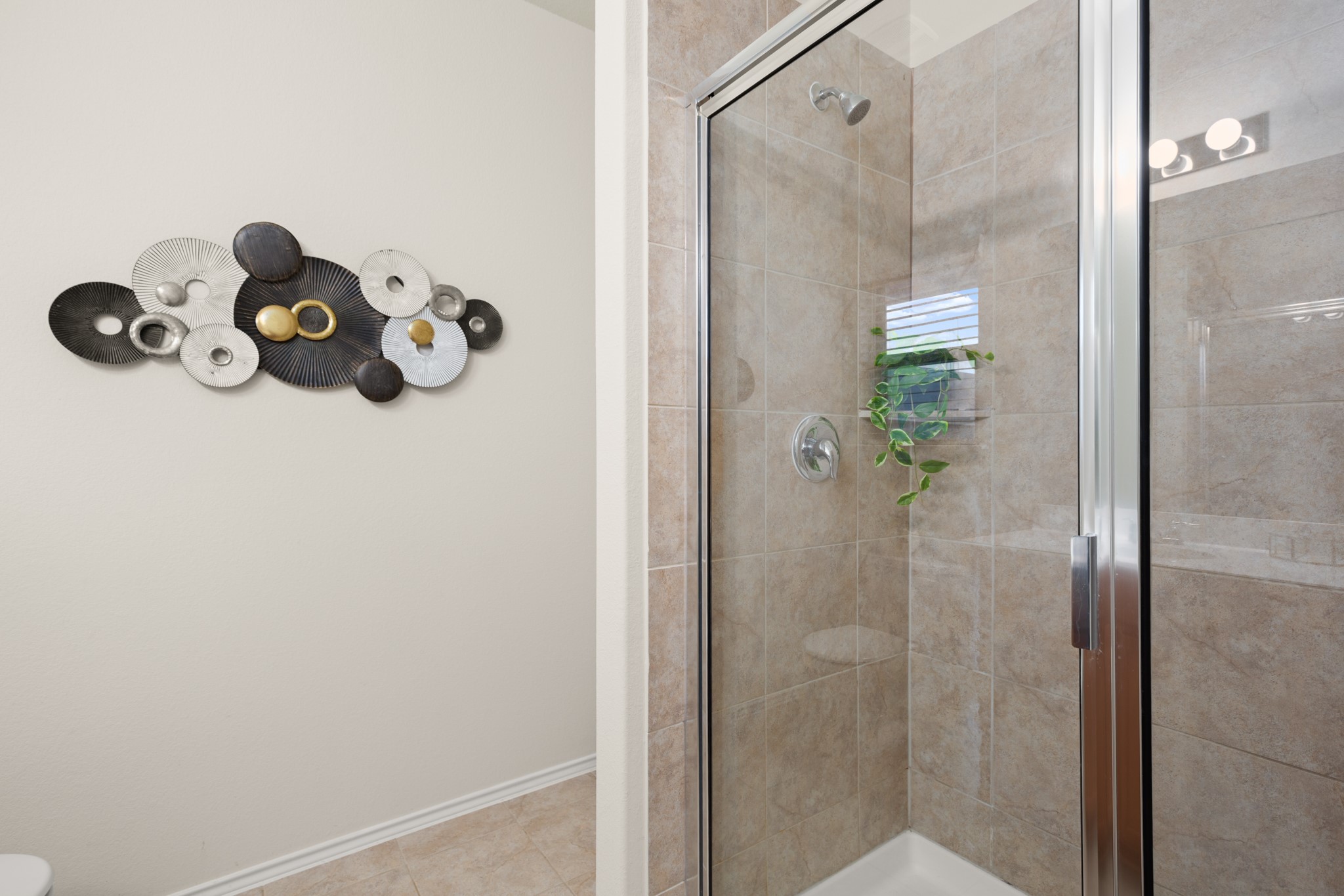 380 Bonnet Boulevard Georgetown, TX 78628 - Photo 18 of 26 a bathroom with a window and other shower