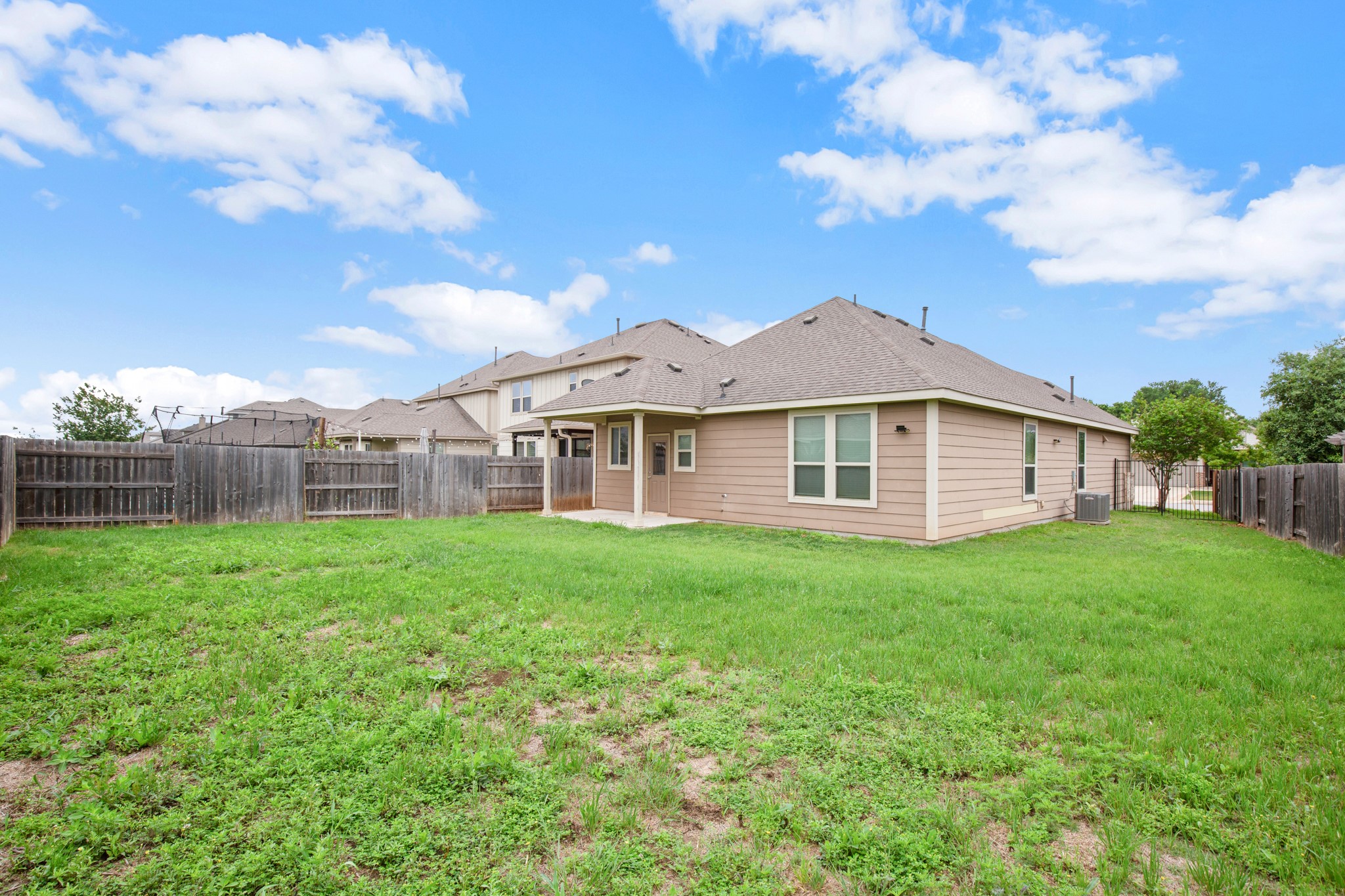 380 Bonnet Boulevard Georgetown, TX 78628 - Photo 19 of 26 a view of a yard in front of a house with a large tree