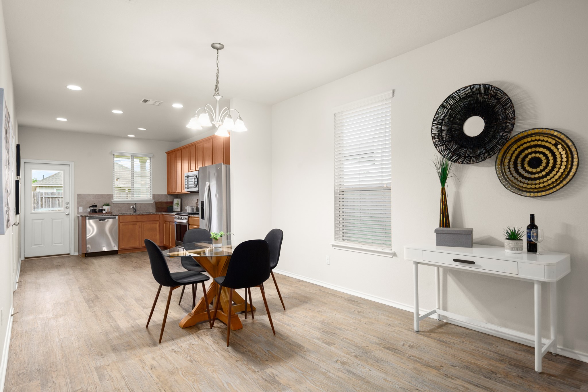 380 Bonnet Boulevard Georgetown, TX 78628 - Photo 5 of 26 a kitchen with a table and chairs in it