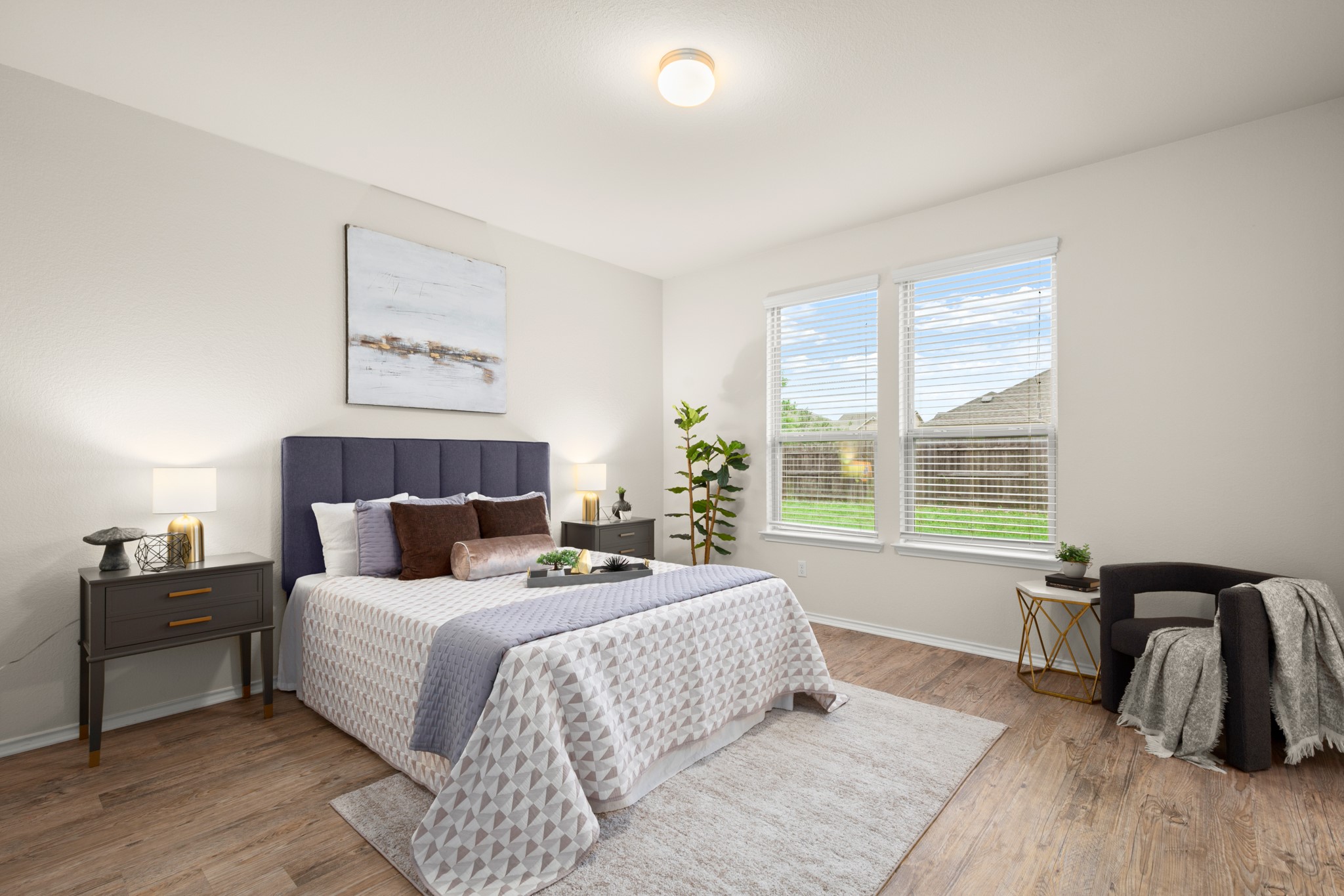 380 Bonnet Boulevard Georgetown, TX 78628 - Photo 6 of 26 a bedroom with a bed and a large window