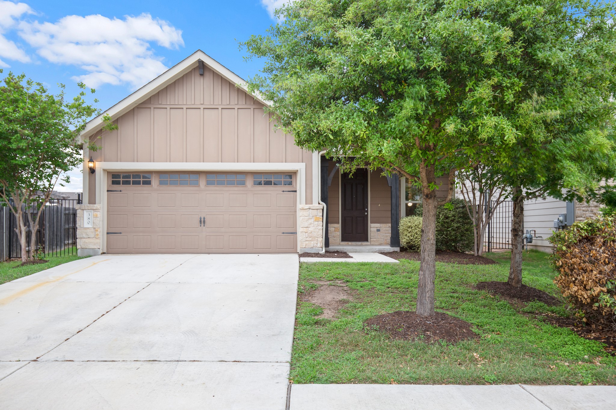 380 Bonnet Boulevard Georgetown, TX 78628 - Photo 9 of 26 a front view of house with a garden