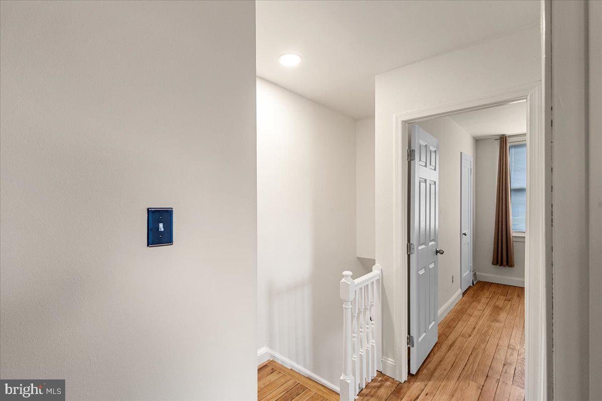 4027 D Street Southeast Washington, DC 20019 - Photo 20 of 32 a view of a hallway with wooden floor
