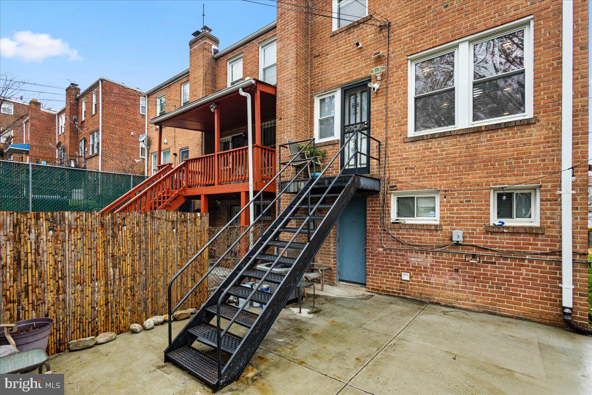 4027 D Street Southeast Washington, DC 20019 - Photo 27 of 32 a front view of a house with large windows