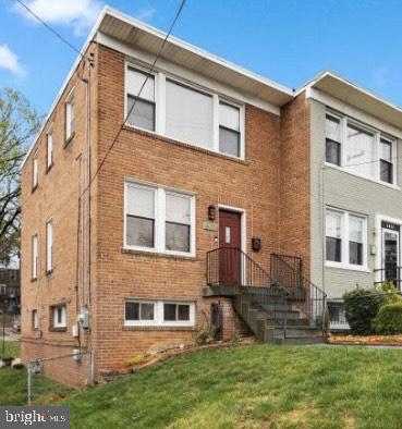 4027 D Street Southeast Washington, DC 20019 - Photo 3 of 32 front view of a house with a yard