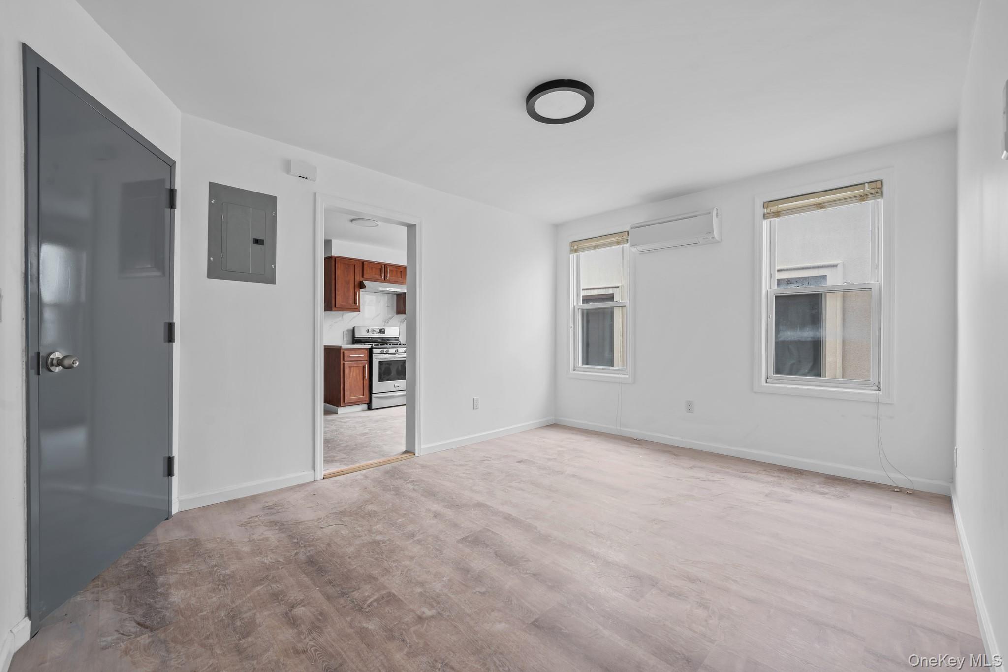 58-44 Fresh Pond Road Queens, NY 11378 - Photo 20 of 25 a view of an empty room with a window