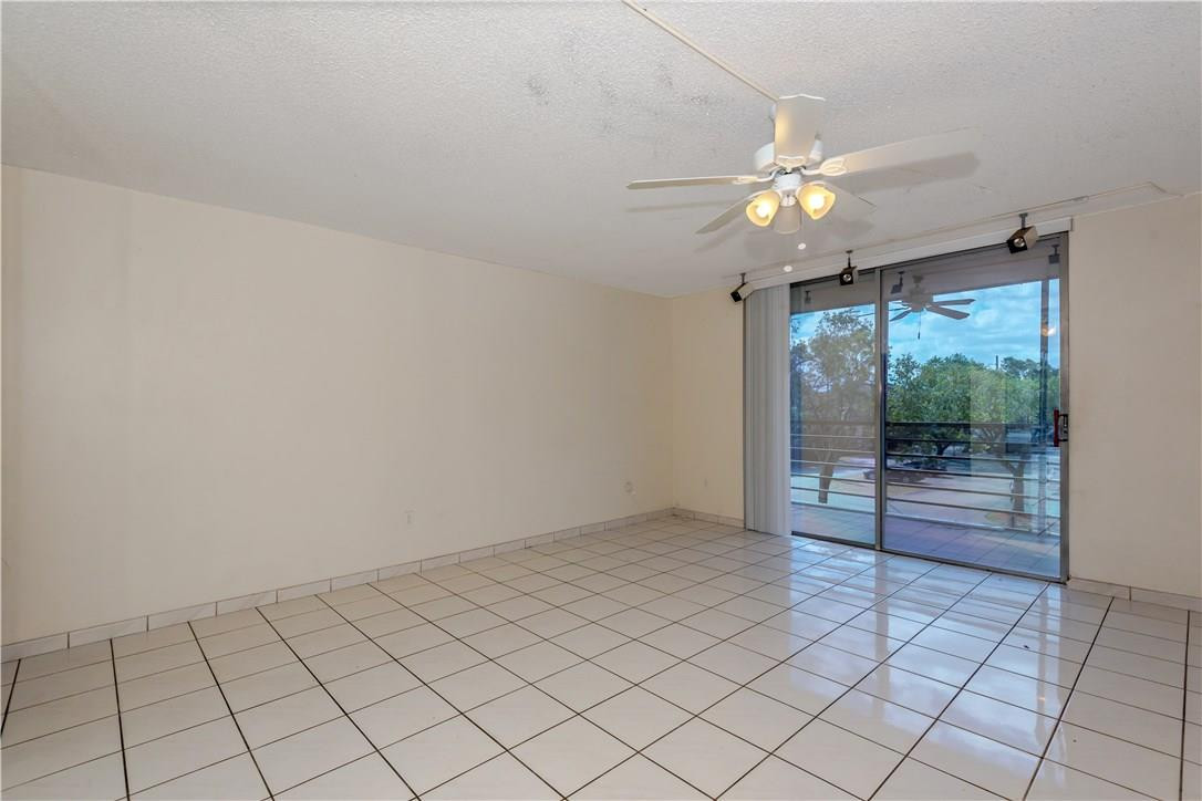 3285 Foxcroft Road, Unit E317 Miramar, FL 33025 - Photo 2 of 28 a view of an empty room and window