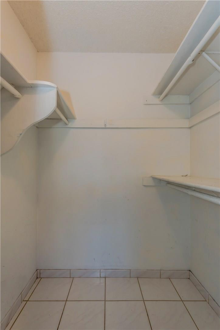 3285 Foxcroft Road, Unit E317 Miramar, FL 33025 - Photo 23 of 28 a view of a closet