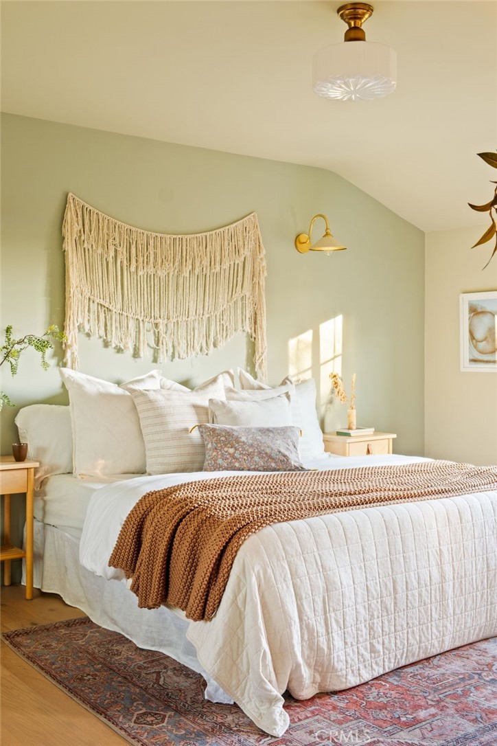 1578 Morada Place Altadena, CA 91001 - Photo 25 of 58 a bedroom with a bed and a couch