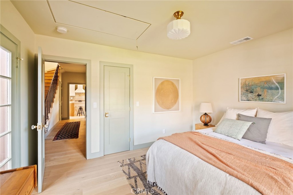 1578 Morada Place Altadena, CA 91001 - Photo 40 of 58 a bedroom with a bed and a window