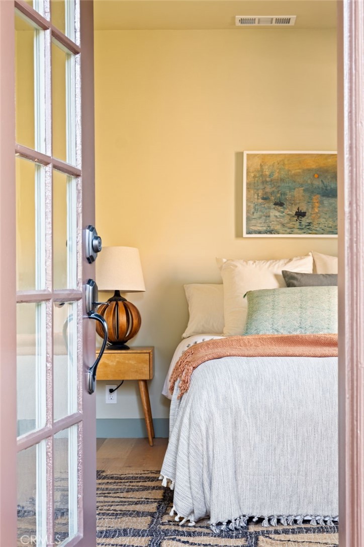 1578 Morada Place Altadena, CA 91001 - Photo 41 of 58 a bedroom with a bed and a window