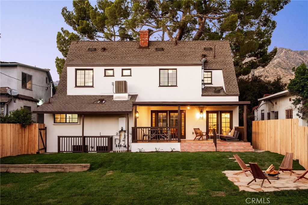 1578 Morada Place Altadena, CA 91001 - Photo 47 of 58 a front view of a house with a garden and outdoor seating