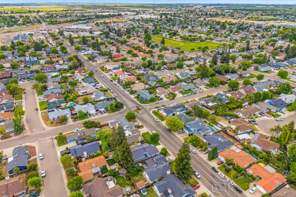 an aerial view of residential building with parking space