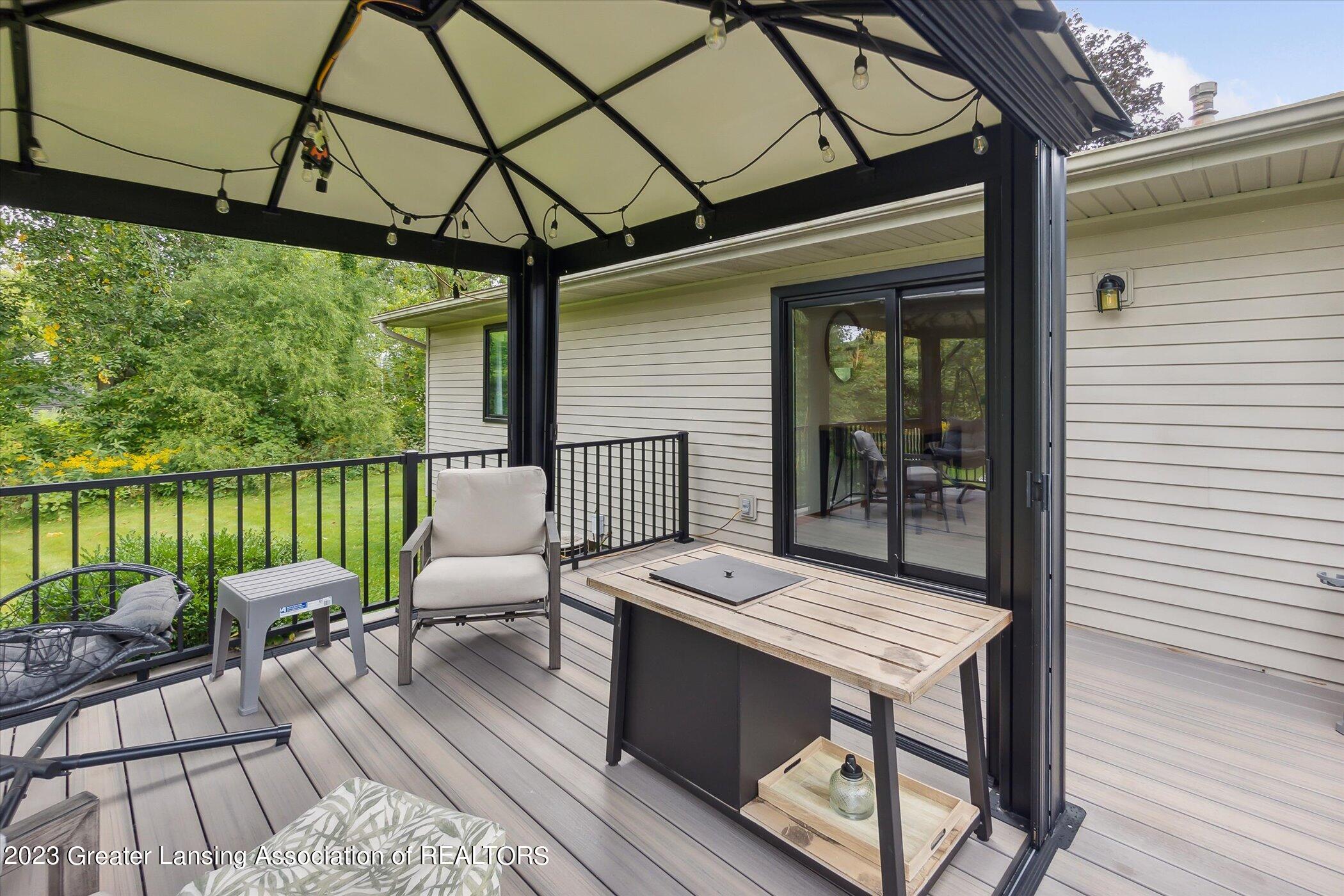 5151 Sleight Road Bath, MI 48808 - Photo 41 of 56 Incredible deck.