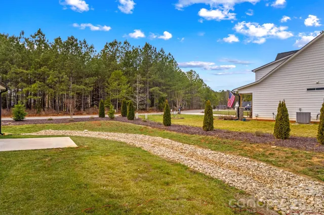 a view of a playground with basketball court